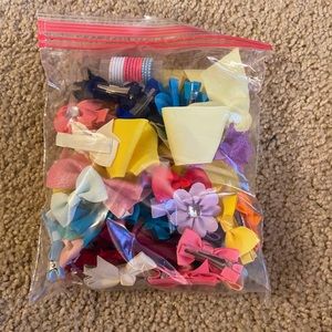 Bag of hair bows for baby